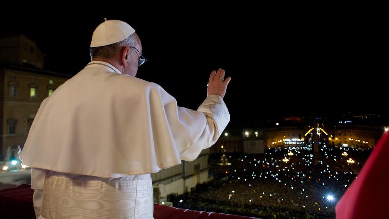Newly elected Pope Francis I, Cardinal Jorge Mario Bergoglio of Argentina appears on the balcony of St. Peter's Basilica after being elected by the conclave of cardinals, in a photograph released by Osservatore Romano at the Vatican, March 13, 2013. White smoke rose from the Sistine Chapel chimney and the bells of St. Peter's Basilica rang out on Wednesday, signaling that Roman Catholic cardinals had elected a pope to succeed Benedict XVI. REUTERS/Osservatore Romano (VATICAN - Tags: RELIGION TPX