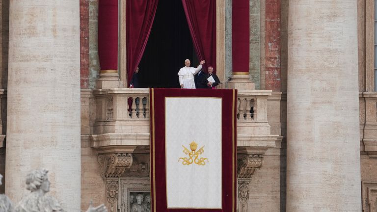 Pope Leo appears at the central balcony of St Peter's Basilica. Pic: AP