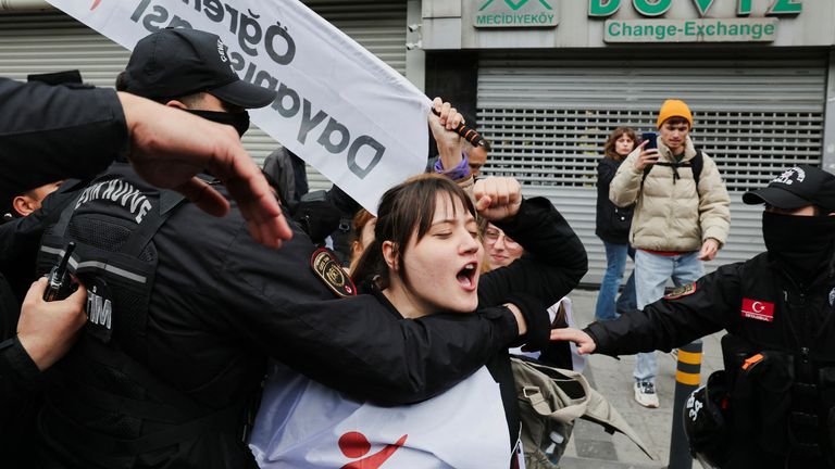 Protesters scuffle with riot police as they attempt to defy a ban and march on Taksim Square to celebrate May Day in Istanbul, Turkey.
Pic: Reuters