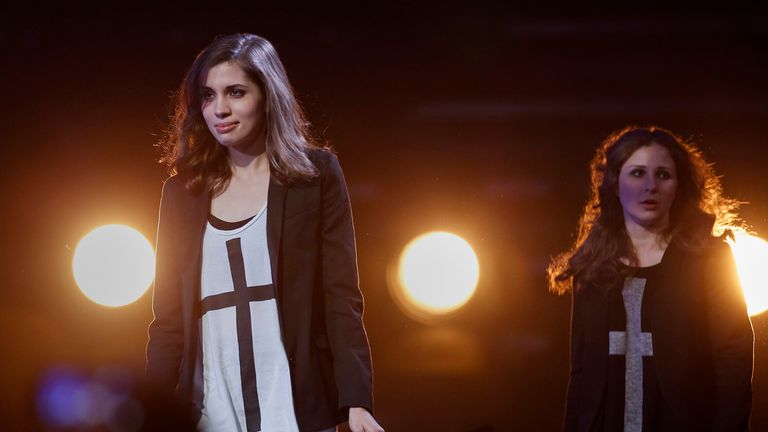 Two members of Russian punk rock band Pussy Riot attend an Amnesty International concert in New York In 2014, demanding Russia releases political prisoners. Pic: Reuters