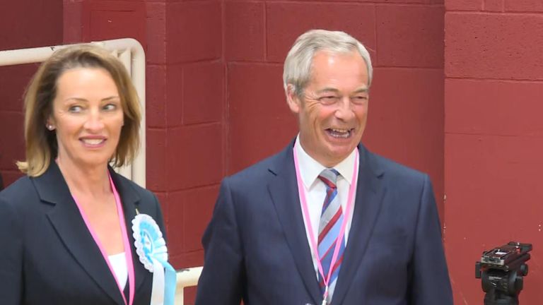 Nigel Farage with Reform's Runcorn candidate Sarah Pochin