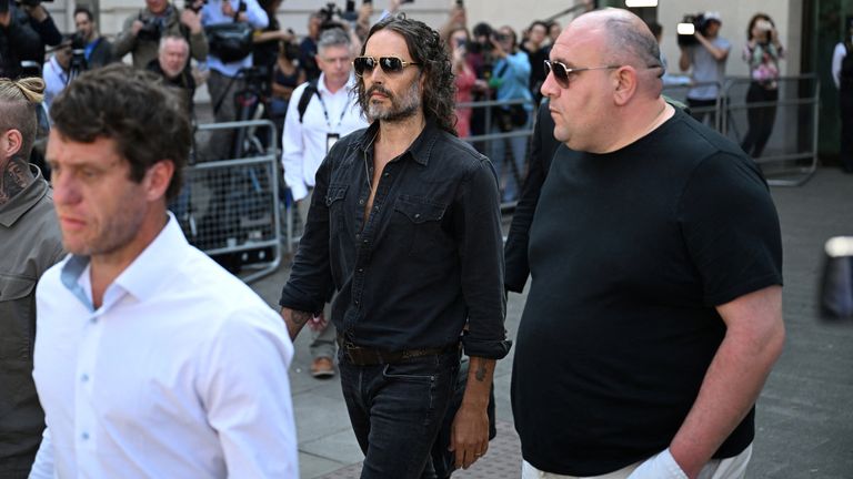 Russell Brand leaves court.
Pic: Reuters