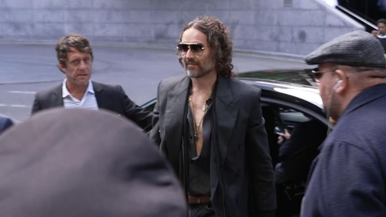 Russell Brand arrives in court
