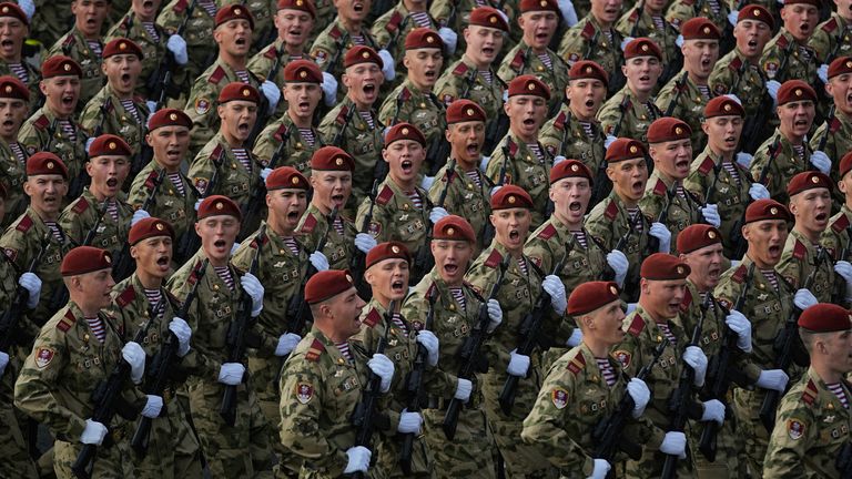 Russian servicemen march towards the Red Square before Victory Day military parade general rehearsal on 7 May. Pic: AP/Pavel Bednyakov