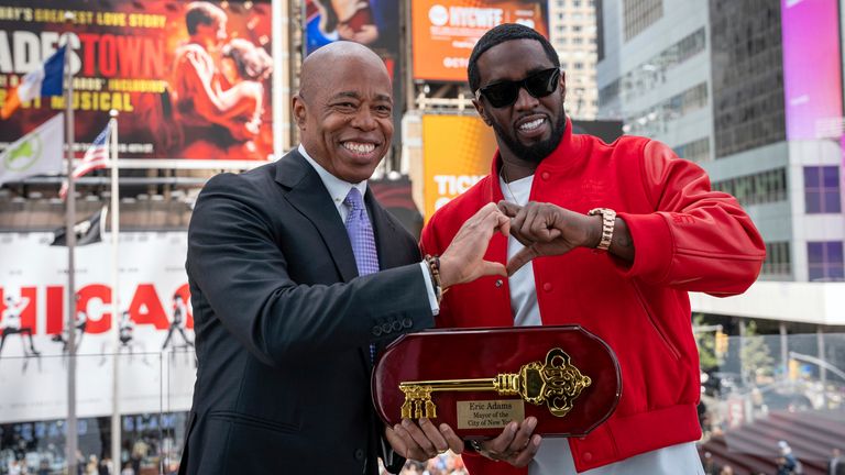 Mayor Eric Adams, left, presenting the Key to the City to hip-hop artist Sean 'Diddy' Combs in New York's Times Square in September 2023. Pic: Office of the New York Mayor/Caroline Rubinstein-Willis via AP