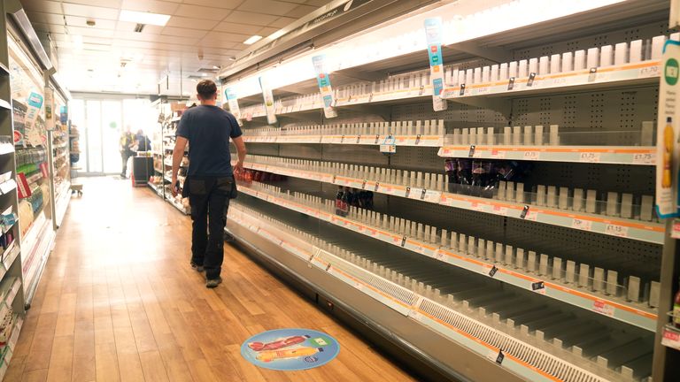 A man walks past empty shelves in a branch of the Co-op in Manchester following the major cyber attack. The Manchester-based group said it is working closely with suppliers to restock its stores after the hack caused significant disruption across its retail chain and led to bare shelves in many of its shops. Picture date: Friday May 16, 2025. PA Photo. Photo credit should read: Danny Lawson/PA Wire