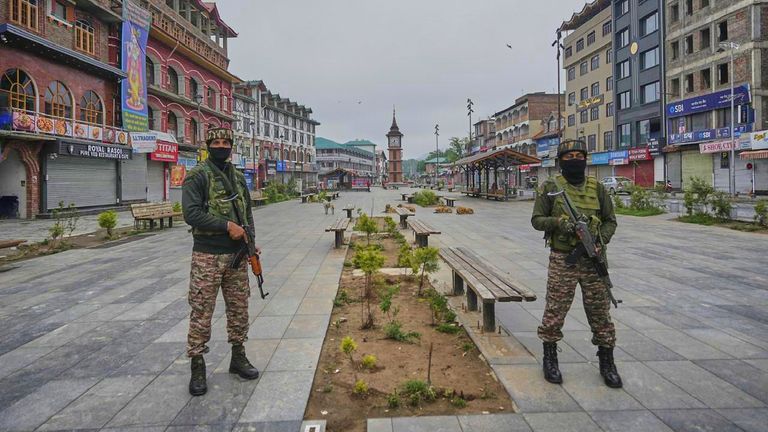 Indian paramilitary soldiers stand guard after loud explosions were heard in Srinagar, in Indian controlled Kashmir, Saturday, May 10, 2025.(AP Photo/Mukhtar Khan)