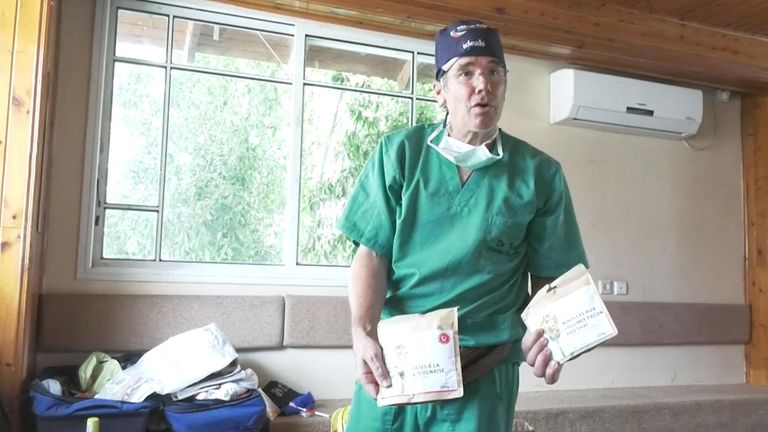 Dr Tom Potokar holds the ready meals the doctors eat