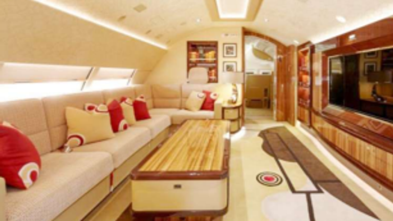 Inside the Qatari plane Mr Trump wants to use as a replacement for Air Force One. An open seated area with a sofa, large coffee table and larger TV.
Pic: Amac Aerospace