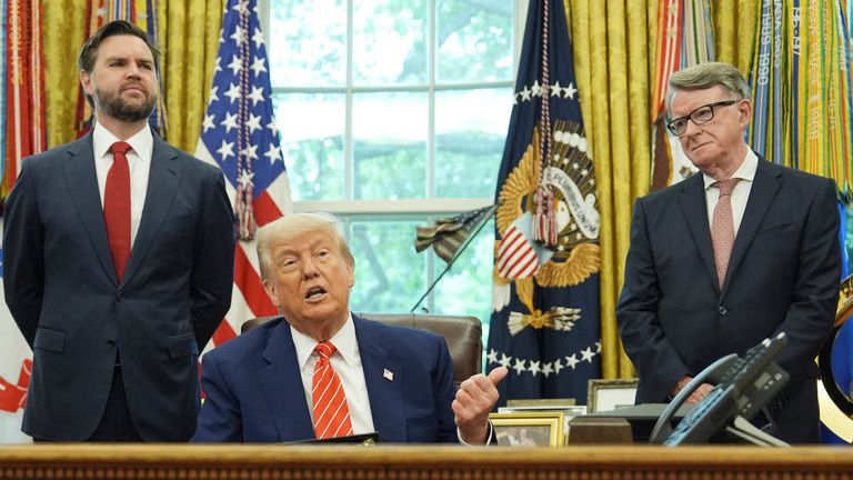 President Donald Trump, center, with from l-r., Vice President JD Vance, and Britian's ambassador to the United States Peter Mandelson, making remarks on a trade deal between U.S. and U.K. in the Oval Office of the White House, Thursday, May 8, 2025, in Washington. (AP Photo/Evan Vucci)