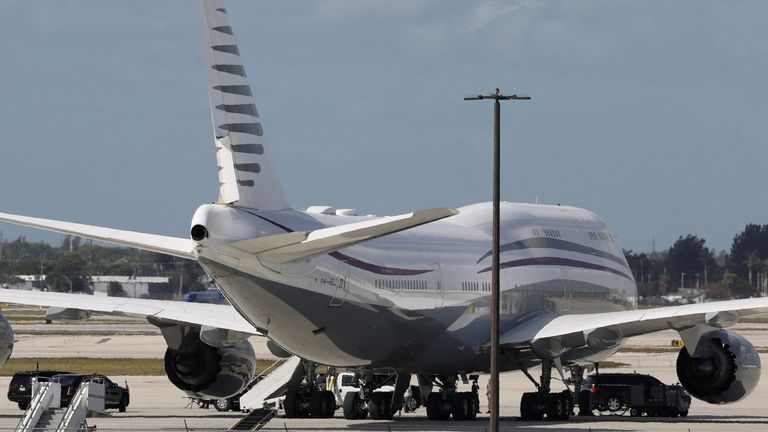 Mr Trump's motorcade parked next to a 12-year-old Qatari-owned Boeing 747-8 that the US president was touring in West Palm Beach, Florida, in February.
Pic: Reuters/Kevin Lamarque