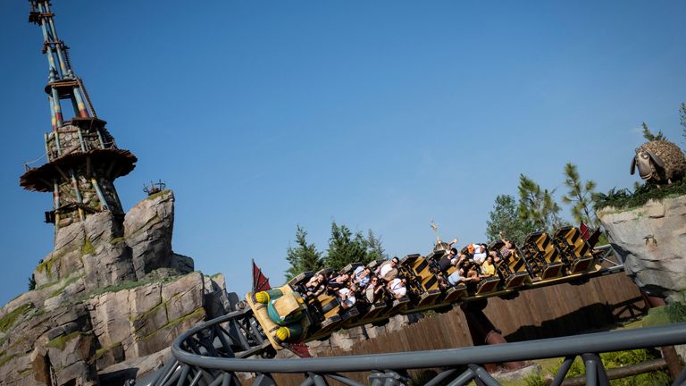 People ride the Dragon’s Racers Rally roller coaster at “How to Train Your Dragon - Isle of Berk” world in Universal Epic Universe theme park ahead of the grand opening ceremony in Orlando, Florida, U.S. May 20, 2025. REUTERS/Marco Bello