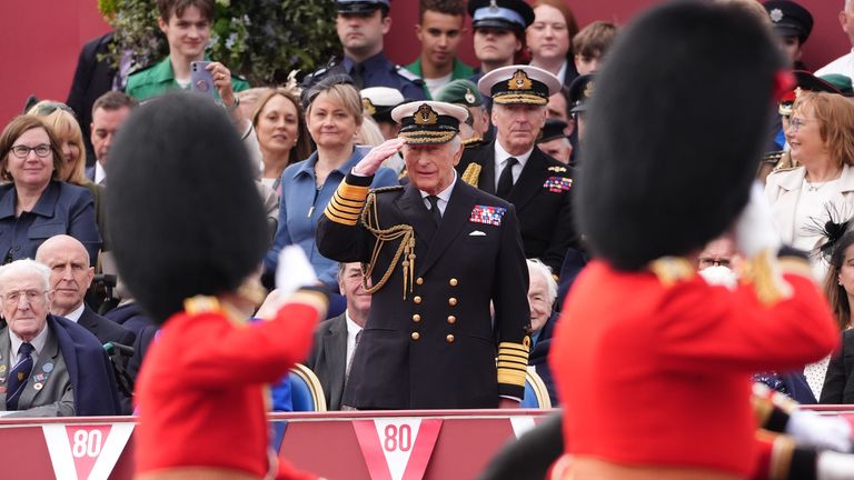 King Charles takes the salute from the military procession for the 80th anniversary of VE Day.
Pic: PA