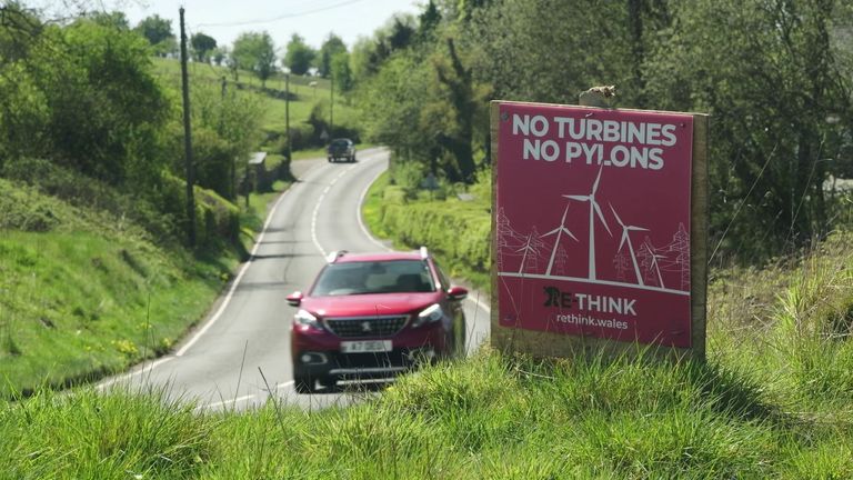 A sign opposing turbines and pylons amid local opposition in parts of Wales