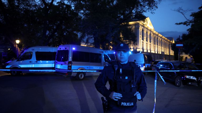 Polish police secure an area at the Warsaw University campus after an attack with an axe, in Warsaw, Poland.
Pic: Reuters
