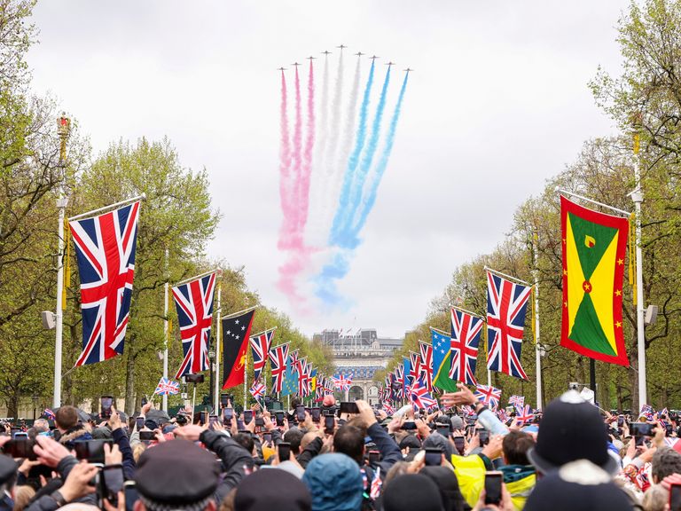 LONDON, ENGLAND - MAY 06: The Royal Air Force Aerobatic Team otherwise known as The Red Arrows fly down The Mall and over Buckingham Palace during the Coronation of King Charles III and Queen Camilla on May 06, 2023 in London, England. The Coronation of Charles III and his wife, Camilla, as King and Queen of the United Kingdom of Great Britain and Northern Ireland, and the other Commonwealth realms takes place at Westminster Abbey today. Charles acceded to the throne on 8 September 2022, upon th
