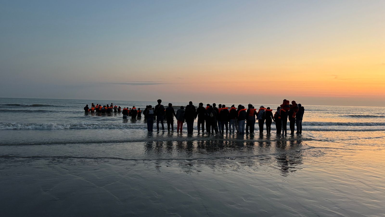 French police forced to watch on as migrants in Dunkirk attempt perilous Channel crossing