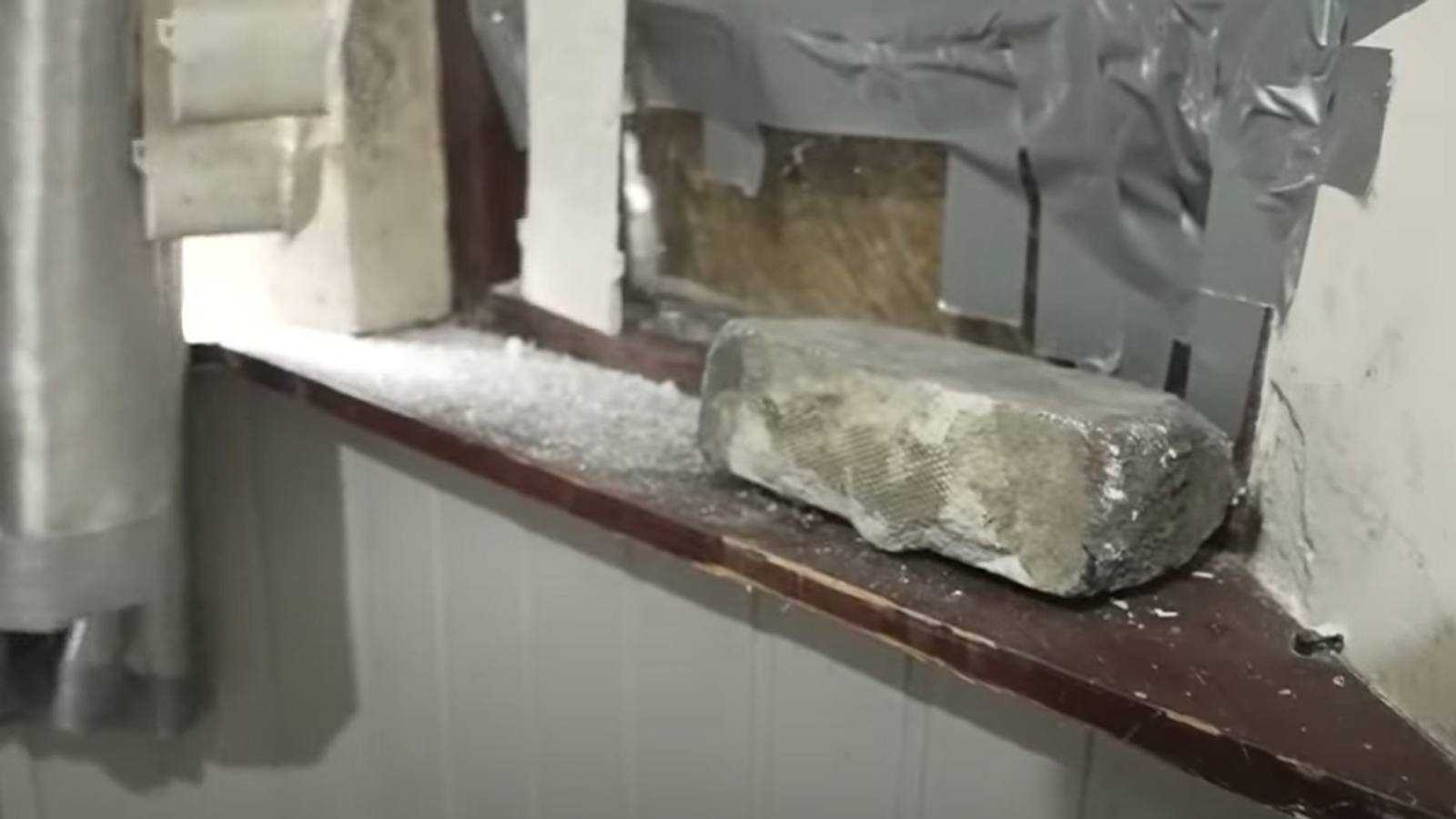 Police working 'night and day' to catch Ballymena rioters - as man describes having brick smashed through window