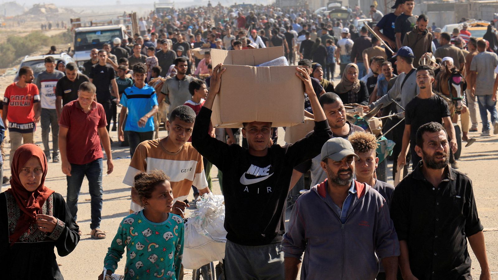 At least 21 killed in Gaza as they went to receive aid, Red Cross hospital says