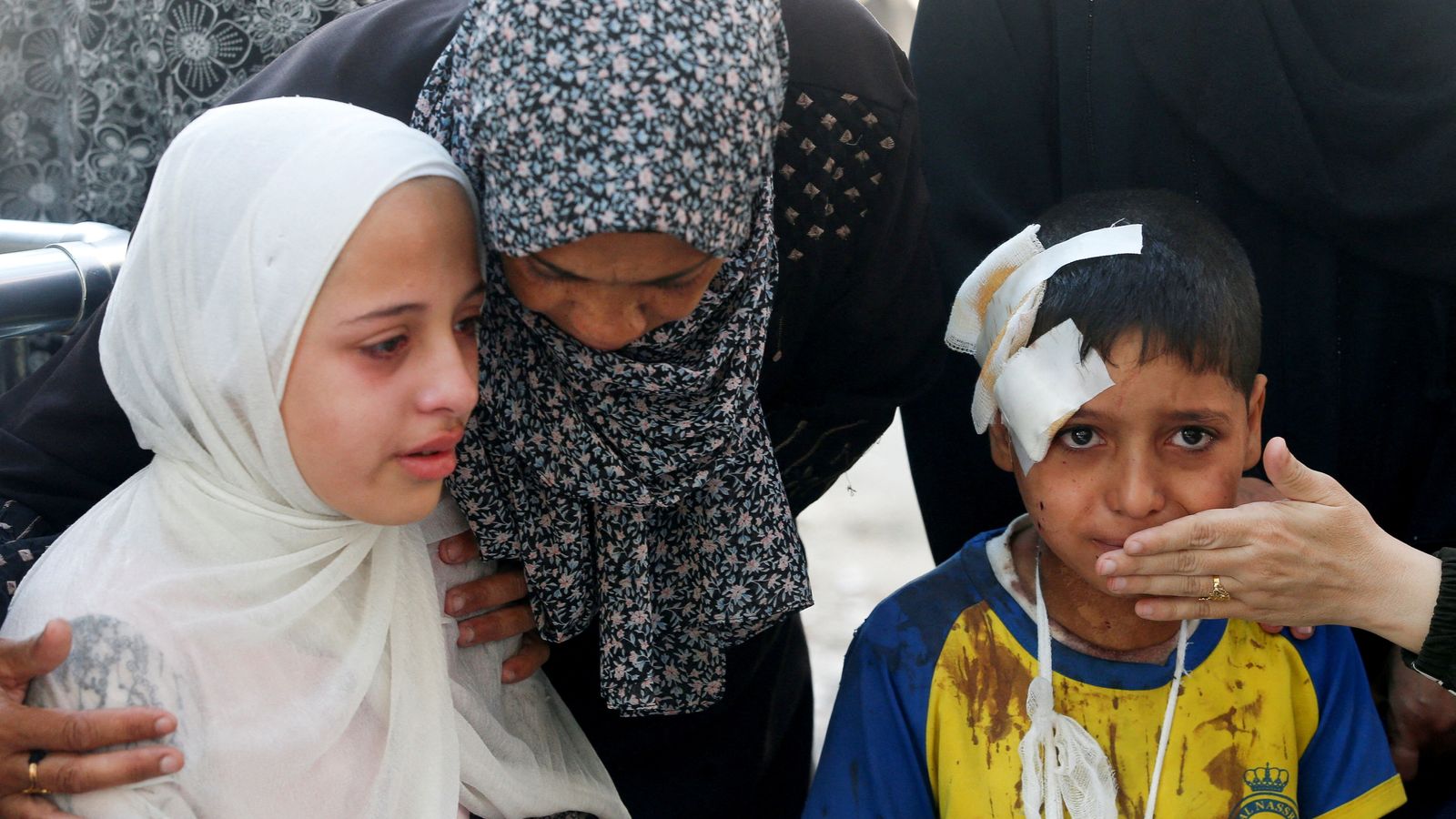 At least 44 people killed after Israeli forces open fire near aid trucks in Gaza, witnesses say