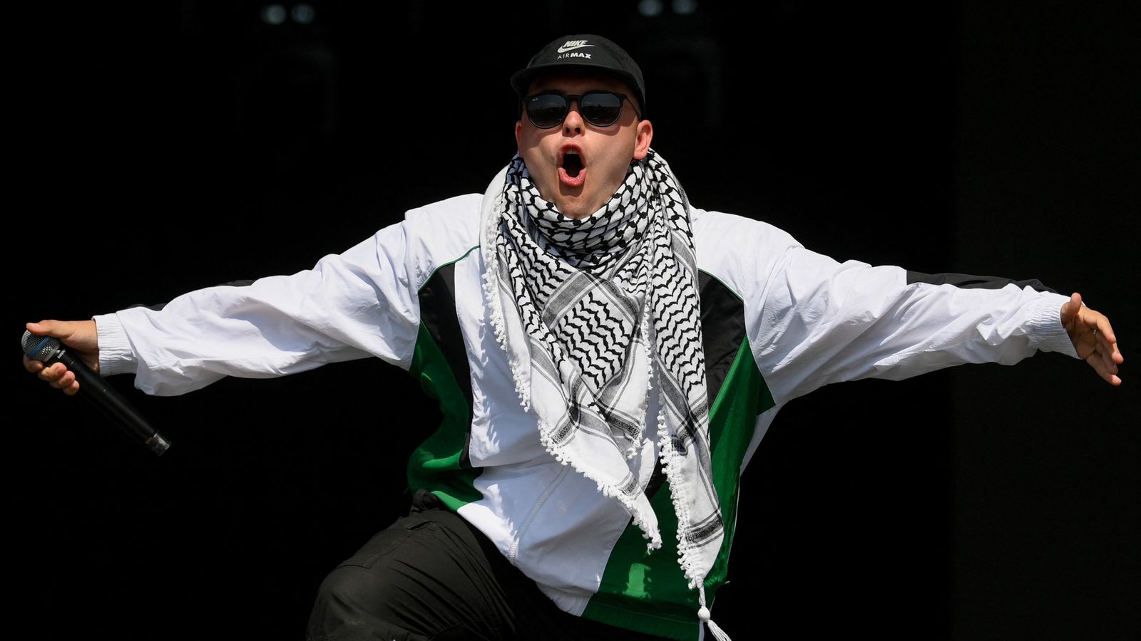 Kneecap rapper Mo Chara says he's a 'free man' as band draw huge Glastonbury crowd