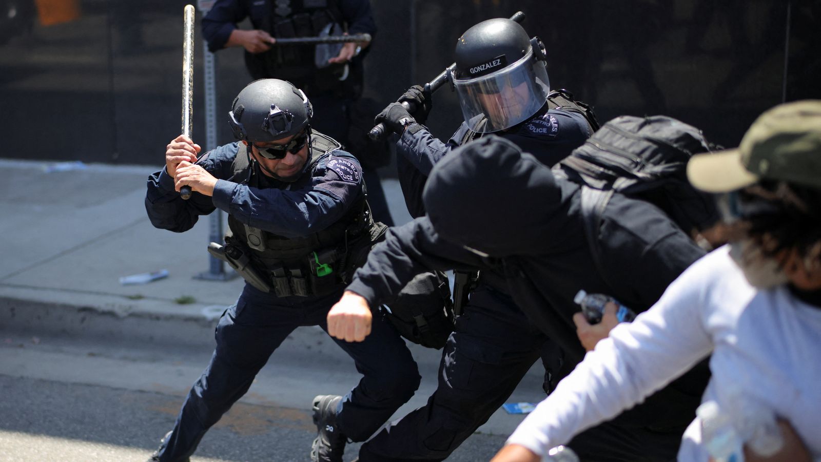 Anger on streets of LA as clashes break out between National Guard and protesters