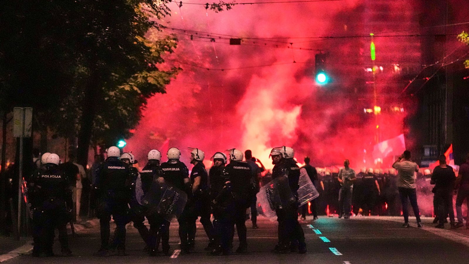 Riot police clash with protesters calling for end to Serbian president's rule