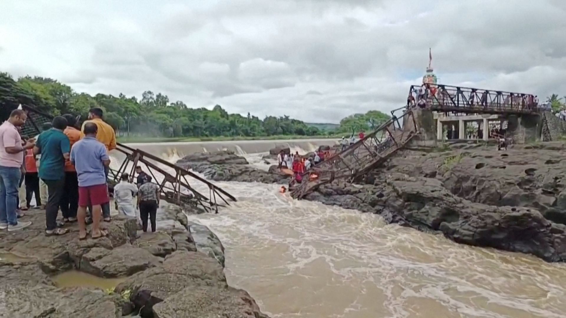 Bridge collapses in India, with deaths and dozens of injuries reported