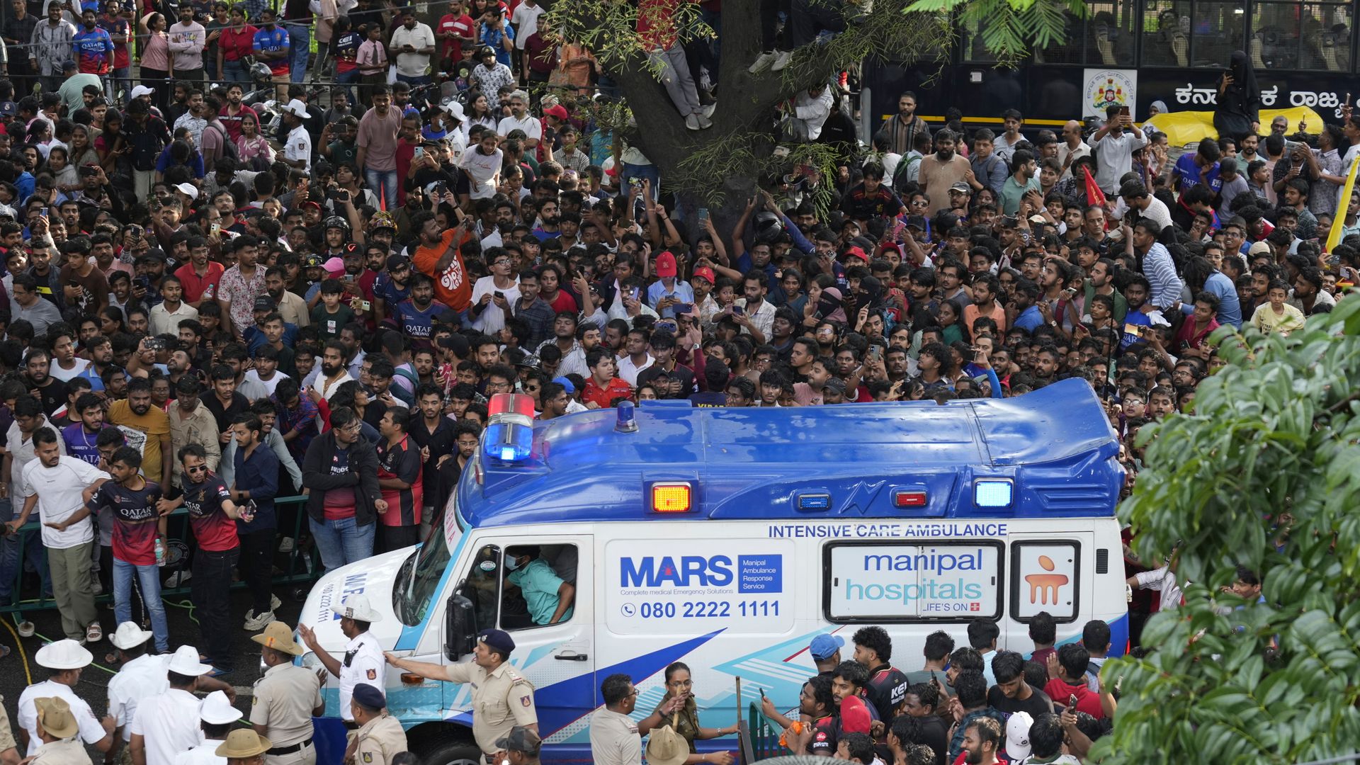 At least 11 dead after stampede among Indian cricket fans celebrating IPL win