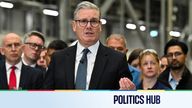 Britain's Prime Minister Keir Starmer leaves the stage after delivering a speech during a visit to the BAE Systems' Govan facility, in Glasg