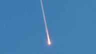 A missile launched from Iran towards Israel is seen from Tubas in the Israeli-occupied West Bank.
Pic: Reuters