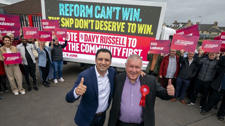 Scottish Labour leader Anas Sarwar (left) and candidate Davy Russell, during a visit to Larkhall while on the campaign trail ahead of the up