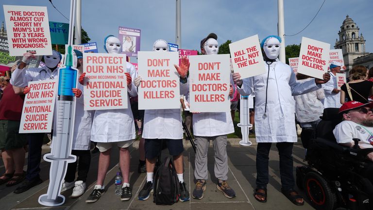 Campaigners opposing the assisted dying Bill demonstrate at Parliament Square, Westminster, central London, ahead of a debate on the Termina