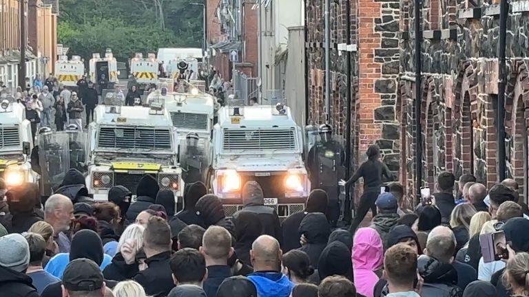 PSNI vehicles form a barricade at Clonavon Terrace, Ballymena. Pic: PA