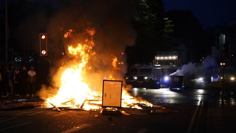 The protest has entered its second night, with fires burning on the streets of Ballymena. Pic: PA