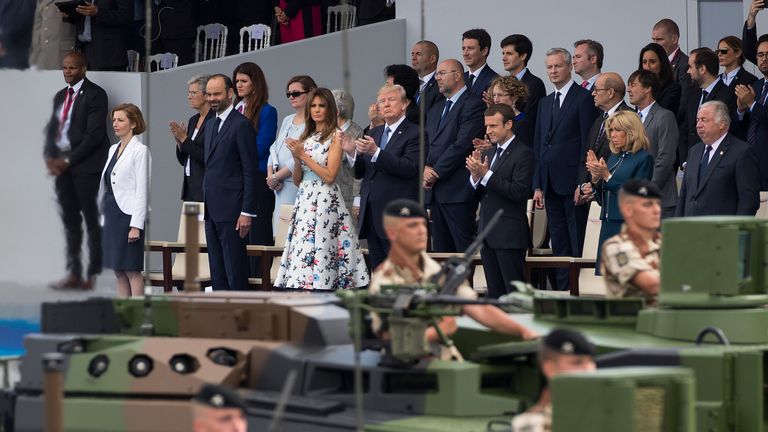 Tanks parade past President Donald Trump, Melania Trump, President Emmanuel Macron and his wife Brigitte Macron in 2017. Pic: AP