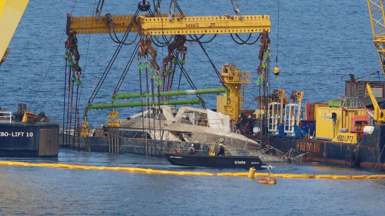 Floating crane ships HEBO LIFT 10 and HEBO LIFT 2 recover the &#34;Bayesian&#34; yacht of British tech entrepreneur Mike Lynch, who died when the ya