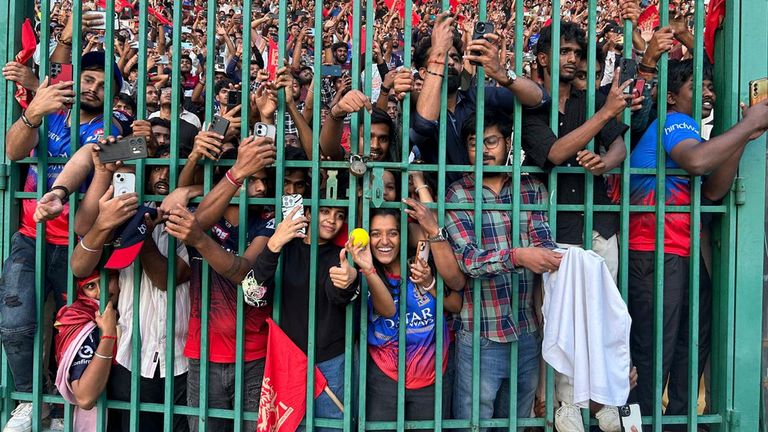Fans gather to celebrate Royal Challengers Bengaluru cricketers, winners of the Indian Premier League. Pic: AP