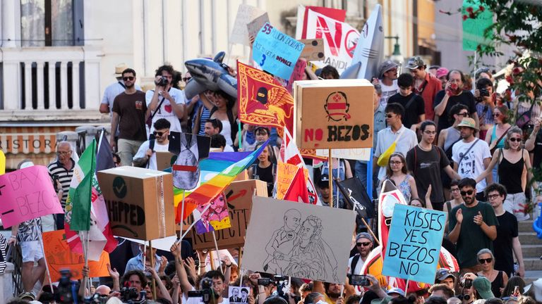 'No Bezos' placards among protest crowds on Saturday. Pic: Reuters
