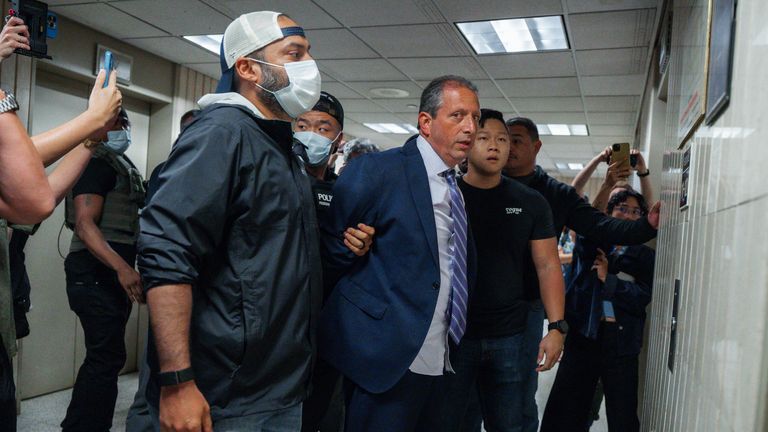 New York City Comptroller Brad Lander under arrest by ICE and FBI agents outside federal immigration court in New York. Pic: AP