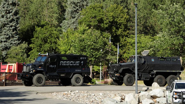 Armoured police vehicles at the scene. Pic: Reuters