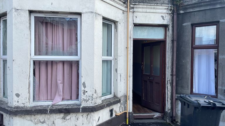 Damaged property at Clonavon Terrace, Ballymena following a protest over an alleged sexual assault in the Co Antrim town.
Pic: PA