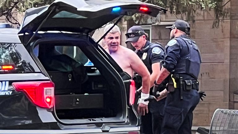 Law enforcement officers detain a suspect, after an attack that injured multiple people, in Boulder, Colorado, U.S. June 1, 2025, in this pi