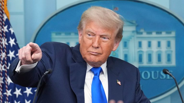 Donald Trump addresses a White House news conference. Pic: AP