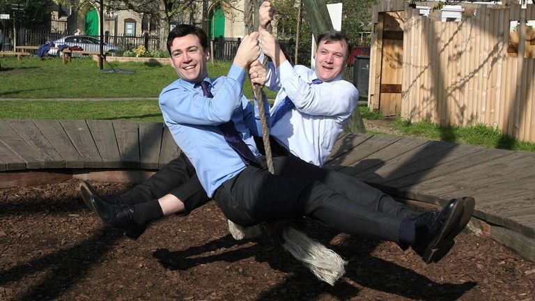 Ministers Ed Balls and Andy Burnham play on the swings at Slade Gardens adventure playground in Brixton to launch a consultation document on