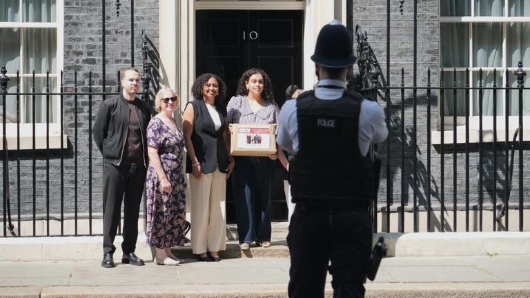 Faustine Petron and fellow campaigners outside of Downing Street
