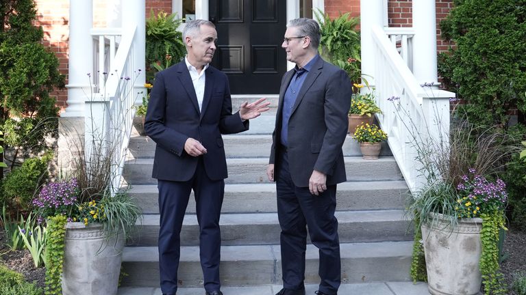 Prime Minister Sir Keir Starmer (right) is greeted by Prime Minister of Canada Mark Carney as he arrives at Rideau Cottage in Ottawa