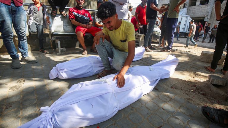 A mourner reacts during the funeral of Palestinians killed in an Israeli airstrike on Al-Baqa cafeteria. Pic: Reuters