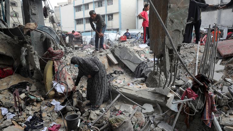 Palestinians inspect the damage at an UNRWA school sheltering displaced people that was hit in an Israeli air strike, in Gaza.
Pic Reuters