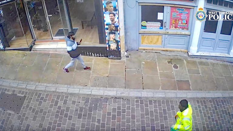 Habibur Masum walking away after he attacked his wife. Masum.
Pic: West Yorkshire Police/PA